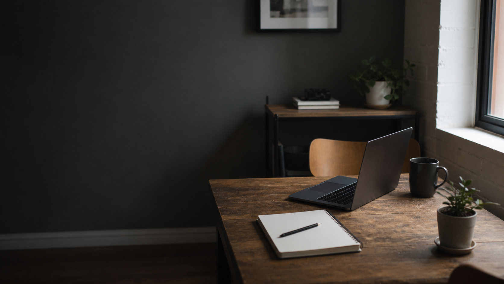 Sophisticated software studio workspace with application interfaces and strategy boards